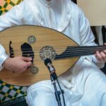 Moroccan-player-wearing-a-djellaba-plays-the-oud